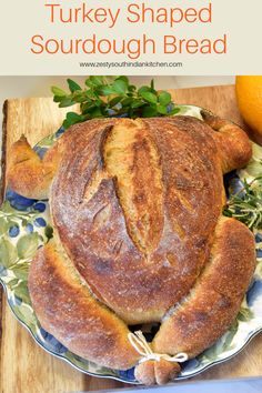 a turkey shaped sourdough bread on a plate