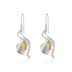 PRICES MAY VARY. Elegant Design: These earrings feature a dainty calla lily flower design, adding a touch of elegance and sophistication to any outfit. Suitable for both casual and formal occasions. Size&Material: 1.5*0.55inches.The calla lily earrings are made of high-quality zinc alloy, ensuring long-term use. Lightweight construction provides all-day comfort without weighing down your ears. Occasions: The ethnic flower earrings are suitable for birthdays,Valentine's Day, parties, graduation g Lily Flower Design, Calla Lily Flower, Lily Earrings, Gifts For Gf, Women Crafts, Earrings Elegant, Earrings Dainty, Elegant Flowers, Lily Flower