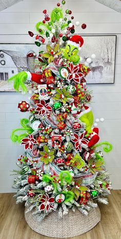 a christmas tree decorated with green and red ornaments