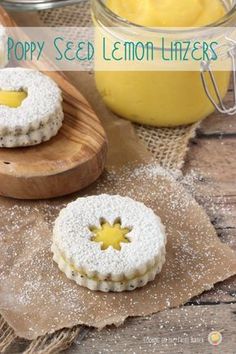 homemade poppy seed lemon limes on a wooden board with powdered sugar and jars in the background