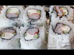 several sushi rolls are arranged on a plate