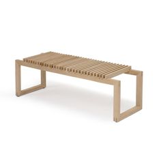 a wooden bench sitting on top of a white floor