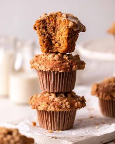 three muffins stacked on top of each other with frosting in the middle