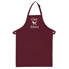 an apron with the words chef julian on it and two crossed spatulas in white