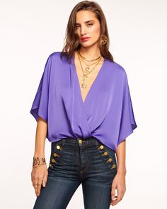 Mckinley V-Neck Bodysuit Sleek V-neck Blouse For Date Night, Sleek V-neck Party Blouse, Silk V-neck Top For Night Out, Satin V-neck Blouse For Night Out, Chic Satin V-neck Tops, Chic Surplice Neckline Tops For Evening, Summer Satin V-neck Blouse, Chic Silk V-neck Blouse, Glamorous V-neck Blouse For Summer