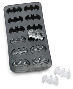 batman ice cube molds are shown in the shape of bats and bats on a white background