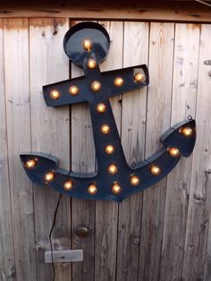 an anchor with lights on the side of it