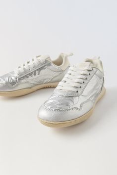 METALLIC SNEAKERS - Silver | ZARA United States Silver Tennis Shoes, Silver Sneakers Outfit, Blazers Shoes, Metallic Sneakers, Silver Sneakers, Cardigan Sweater Dress, Cardigan Sweater Jacket, Leather Shirt, Tshirt Skirt