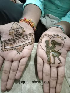 two hands with hendi designs on them, one is holding the other's hand