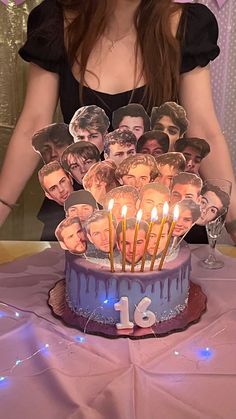 a birthday cake with candles in the shape of pictures on it and people's faces