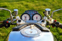 the gauges and speedometers are visible on this motorcycle's handlebars