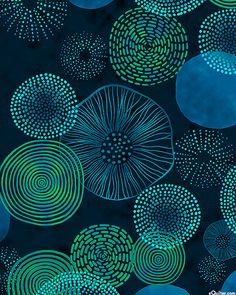 blue and green circles are arranged in the shape of an abstract pattern on a black background