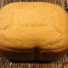 a loaf of bread sitting on top of a cooling rack