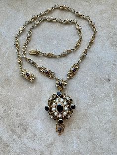 Victorian Art Nouveau Austro Hungarian Natural Garnet Pearl Sterling Silver Gold Vermeil Antique Pendant Necklace Excellent condition, Measures aprox 19 1/4" around  Pendant measures aprox 2 1/2" long          Weighs    43 grams See matching bracelet in link below  https://www.etsy.com/listing/1774781572/circa-1800s-beautiful-austro-hungarian?click_key=9a3abe52a9fa6a9b7aa20055a7b94aac48a12288%3A1774781572&click_sum=122e7b6b&ga_search_query=AUSTRO&ref=shop_items_search_1&pro=1&frs=1&sts=1 Persian Jewelry, Austro Hungarian, Antique Pendant, Bib Necklaces, Victorian Art, Matching Bracelet, Matching Bracelets, Gold Vermeil, Antique Jewelry