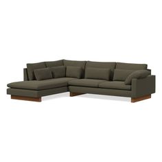 a large sectional couch with pillows on the top and bottom corner, in grey fabric