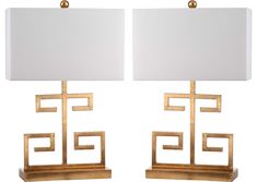 two lamps with white shades on each one