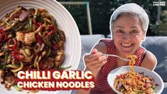 a woman holding a plate of food with the words chilli garlic chicken noodles