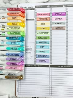 the contents of a planner with markers and pens