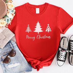 ABOUT THIS ITEM  Merry Christmas Tree Shirt | Christmas Tree, Christmas Gift,Holiday Gift, Holiday Tree Shirt, Christmas Family Matching Shirt, Christmas Tee Merry Christmas Christmas season family tee, Gift for mom, unisex adult, youth, toddler and baby shirt. * ORDER INSTRUCTIONS *  Check and review all listing photos. Pick up your item's size and color from drop down menus.  Choose the quantity.  Click "Add to Cart" button.  Fill in the personalization box as recommended if provided.  You can Christmas Tree Shirt, Family Tees, Tree Shirt, Christmas Tees, Baby Shirts, Holiday Tree, Gifts Holiday, Matching Shirts, Favorite Shirts