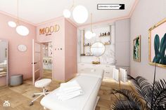 a bathroom with pink walls and white furniture in the center, along with large round lights hanging from the ceiling