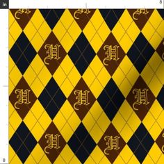 a yellow and black checkered pattern with the letter h on it