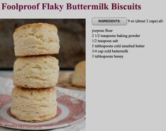 three scones stacked on top of each other on a red and white plate with words below it