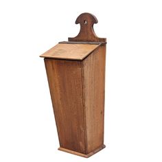 an old wooden box with a bird on it's head is shown against a white background