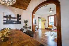 the dining room is clean and ready for guests to use it as an entertaining space