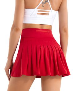 PRICES MAY VARY. Women's Pleated Tennis Skirt - This high-waisted athletic skirt features a pleated hemline in the back. Creates a flowing look and enhances feminine curves. This mini skirt lets you show off your best self in sports Built-In Short Liner - Enjoy maximum comfort and support on the court with this tennis skirt's built-in shorts, which provide added coverage and prevents embarrassing situations, help keep you cool and dry during intense rallies. Golf Skirt with Pockets - This sports Red Tennis Skirt, Dashiki Dress, Sports Tennis, Comfortable Skirts, Pleated Tennis Skirt, Athletic Skirt, Tennis Skirts, Tennis Skort, African Print Dresses