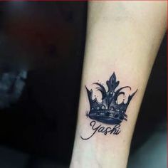 a black and white photo of a tattoo with the word yash written on it