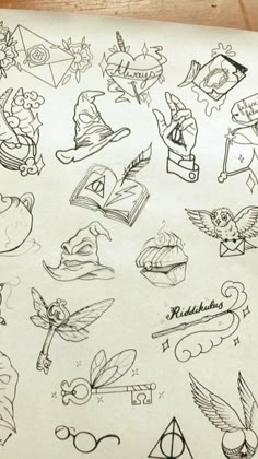 an image of harry potter tattoo designs on paper