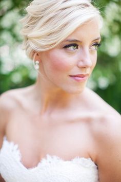 a beautiful blonde woman in a white dress