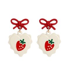 PRICES MAY VARY. Design: The earrings consist of a red bow and a white heart shape pendant (a cute red strawberry pattern on top). The earrings are small, but all the details are rich, such as the heart-shaped pendant, which is edged with wavy lace; the red bow above is wrapped with different patterns. Color Matching: The red bow is like a red ribbon, symbolizing joy and good luck; the pendant is in the shape of a heart, with a red strawberry, looks very cartoonish and cute. The overall color is only red white and green, a simple color, but versatile. Small and Lightweight: Each pair of earrings weighs only 5.4 grams, which is very lightweight. The earrings are relatively small, but the vibrant colors make it impossible to ignore them. These earrings are a great partner for going out, dati