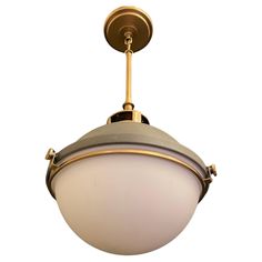 a light fixture with a white glass ball hanging from it's center point, on an isolated background