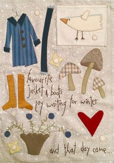 a quilt with various items on it including boots, hats, and flowers in the center