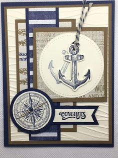 a card with an anchor and compass on it