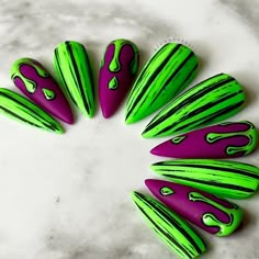 Welcome to LD Nails! 🖤 One set of 10 REUSABLE Press On Nails 🖤 🖤 Made to order in your shape & size 🖤 💚💜It’s Showtime!: green and purple base with hand painted distressed stripes and gooey drips! These nails are dual top coated. The base is matte, the drips are glossy! Purchase INCLUDES an application kit! It consists of: 🖤 detailed application & removal instructions 🖤 a sealed and sanitary mani kit (100/180 file, buffer block, cuticle pusher) 🖤 2 alcohol pads 🖤 nail tabs or glue (glue is standard, request tabs in the personalization box if you prefer them!) *Only one kit is sent per order. Extra kits and kit contents can be picked up here 👉 https://www.etsy.com/ca/listing/817160463/application-kit-press-on-nails-gothic Est. 2020: LD Nails specializes in custom Gothic, Witchy an Green Goth, Its Showtime, Nails Gothic, Halloween Nail Ideas, Halloween Manicure, Alcohol Pads, Drip Nails, Nails Fake