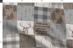 an image of a plaid fabric with deer and pine trees on the side, as well as measurements