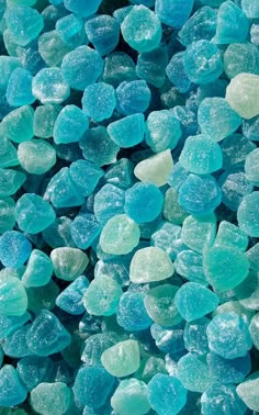 blue and green candies are piled together