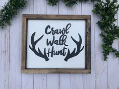 "Crawl Walk Hunt. Perfect addition to any woodland theme nursery! Measures 11\" x 8.5\" It is painted Crisp White with Jet Black lettering and then is finished with a Ebony stained frame. All of my creations are done 100% by freehand without the aid of stencil or vinyl decals. *NOTE* Due to the nature of wood, some minor imperfections, flaws, knots, or dings may be present. This however helps to ensure that your purchase is truly one of a kind!" Hunting Baby Nursery, Hunting Theme Nursery, Crawl Walk Hunt, Deer Nursery Decor, Baby Boy Nursery Woodland, Nursery Decor Woodland