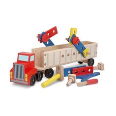 a wooden toy truck with tools in it