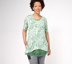 Delightfully designed to show off an easy-breezy layered look, this tank-and-tee twinset takes the guesswork out of everyday outfitting. The tee boasts a bold allover print, while the color-coordinated lace-hemmed tank peeks out the bottom in fab fashion. From LOGO by Lori Goldstein®. Green T-shirt For Summer, Casual Spring T-shirt For Layering, Casual Layered Tops For Spring, Casual Spring Layering T-shirt, Graphic Print T-shirt For Spring Layering, Graphic Print T-shirt For Spring, Lori Goldstein, Easy Breezy, Knit Tank