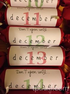 three rolls of christmas crackers with the words december and december written on them