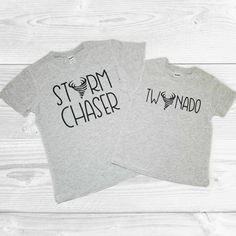 two t - shirts that say storm chaser and tornado chaser on the front