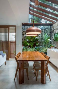 a wooden table sitting in the middle of a room