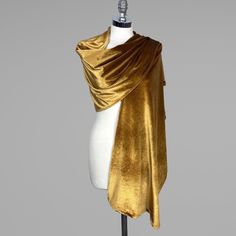 A very elegant velvet shawl for your wedding party or evening dress. Made of soft velvet, very comfortable.  Color: mustard gold (other colors are available) Size: 190 cm x 48 cm approx. You can use it as a wrap, shawl or stola.  The wrap is one sided. WE have matching bags in our Etsy Shop! WE accept credit cards! Warning: Although the fabric we use is of high quality, in certain cases during high humidity of air / humid skin etc. dark navy blue and black color velvet /velour fabric may transfe Velour Shawl, Pirate Wizard, Golden Scarf, Yellow Shawl, Gold Shawl, Cape Shawl, Gold Scarf, Velvet Cape, Wedding Shrug