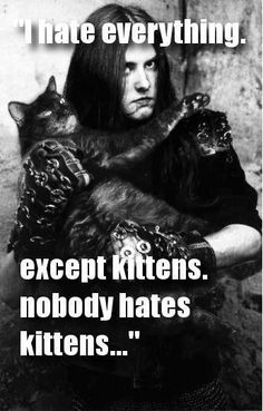 a man with long hair holding a cat in his arms and the caption says i hate everything except kittens, nobody hates kittens