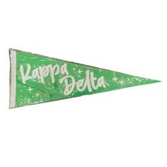 a green and white flag with the word larpa belita written on it