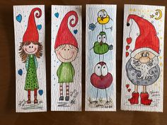 three bookmarks with children's drawings on them, one has an owl and the other is a gnome