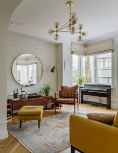 a living room filled with furniture and a piano